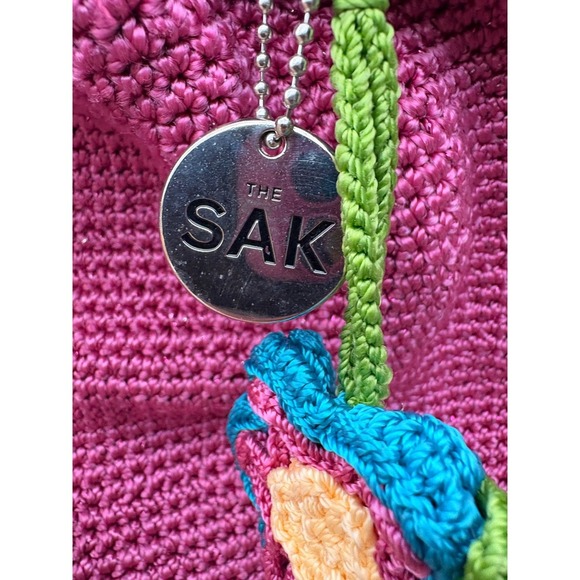The Sak Pink Crochet Drawstring Backpack Boho Flower Charm Berry Knit Bag main image 9